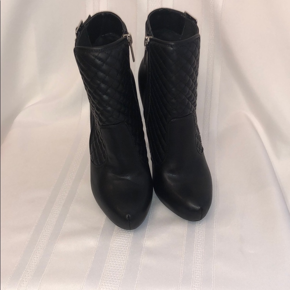 Ankle length zippered high heel boots